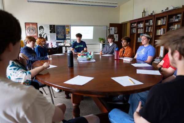 Doane Stuart Upper School Students at a learning table in a classroom