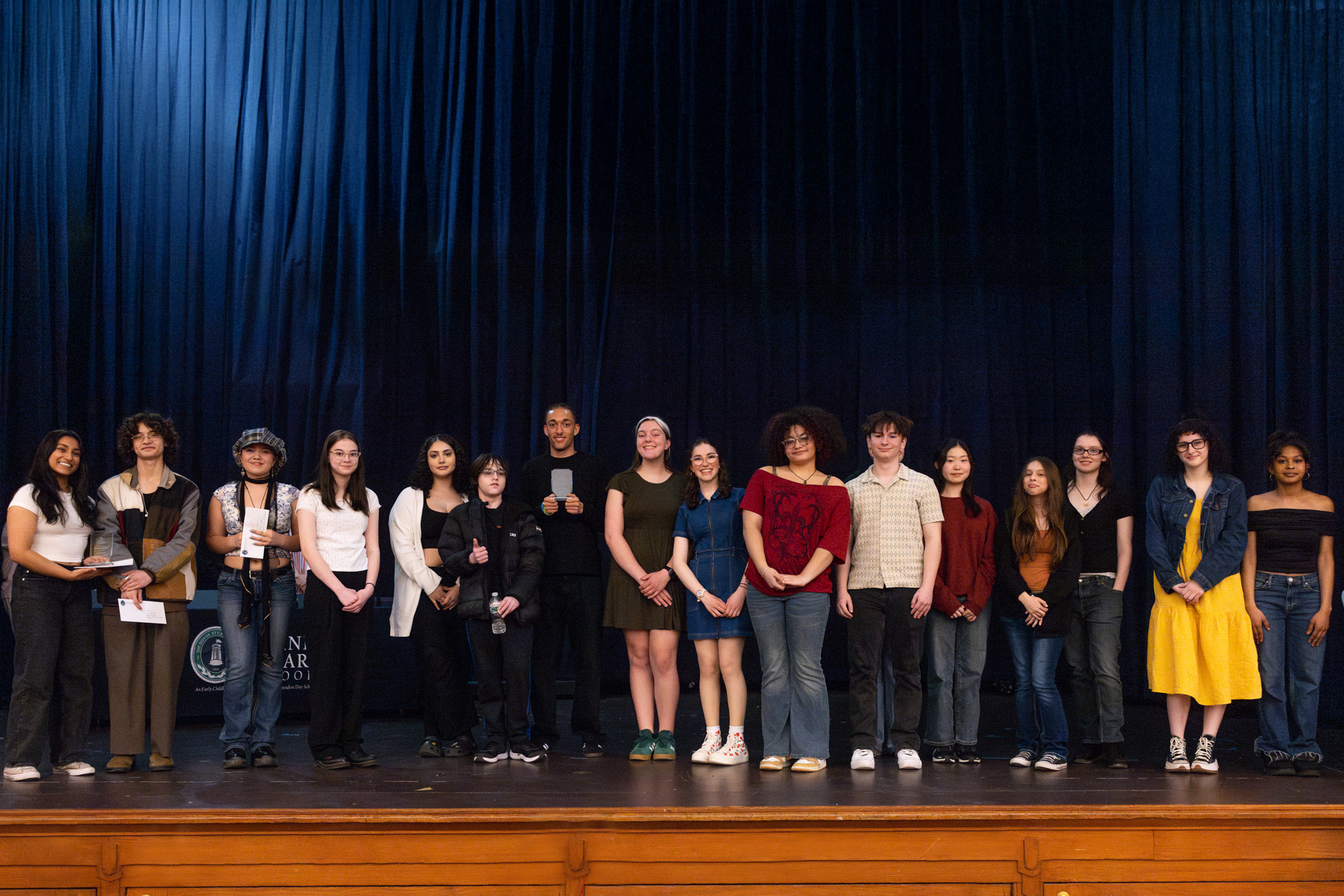 Doane Stuart upper school students in a group on stage