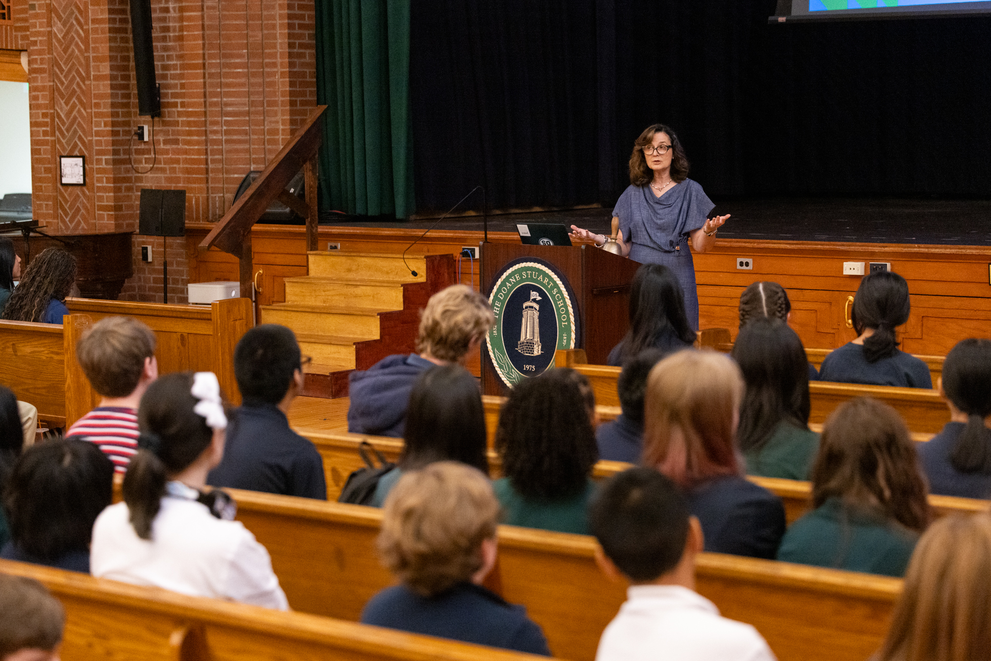 Head of School Marcy Cathey addresses the assembly